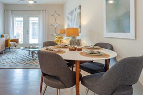 Simpsonville apartment for rent - a dining room with a table and chairs