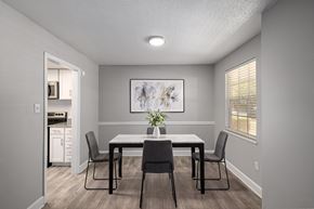 Savannah apartment for rent - A dining room with a table and chairs.