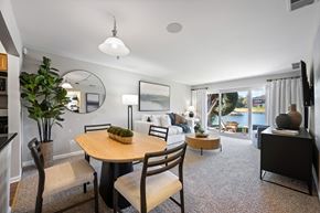 Schaumburg apartment for rent - A dining room with a round table and chairs.