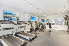 Chicago apartment for rent - A gym with treadmills and exercise bikes.