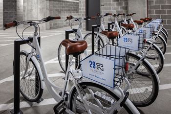 A row of bikes parked in a rack
