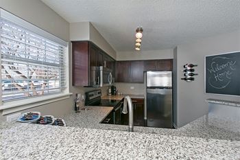 Custom espresso cabinetry w/ brushed nickel hardware