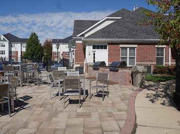 Outdoor grill with intimate seating area