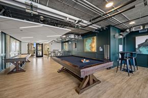 Chicago apartment for rent - a game room with a pool table and ping pong table at Lakeview 3200 Apartments, Chicago, Illinois