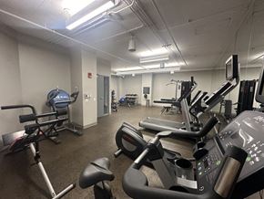 Chicago apartment for rent - a gym with weights and other exercise equipment in a building