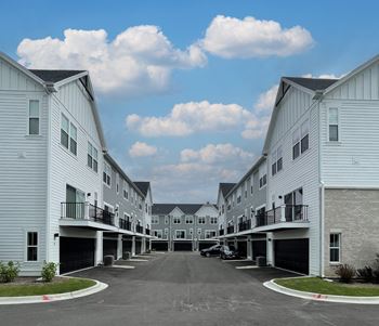 A row of white houses with balconies