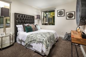 Los Angeles apartment for rent - Fusion Encore Hollywood Apartments bedroom with a large bed and a window.