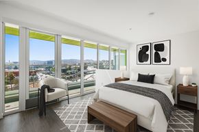 Los Angeles apartment for rent - Fusion Hollywood bedroom with a large bed and a view of the city.