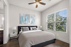 Nashville apartment for rent - State Street Flats apts for rent Nashville TN bedroom with a large bed and a ceiling fan.