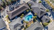 Jacksonville apartment for rent - A bird's eye view of Mandarin Bay Apartments with a swimming pool.