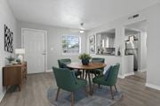 Lakeland apartment for rent - A dining room with a table and chairs at Watermarc Apartments.