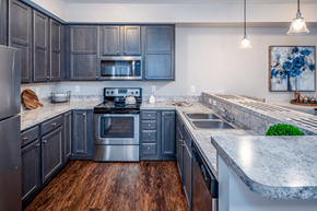 Etna apartment for rent - Arbors at Turnberry pet friendly apartments and townhomes Pickerington, Ohio large kitchen, wood style flooring, stainless steel appliances, cabinet space