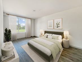 Cincinnati apartment for rent - Altura Apartments large bedrooms featuring spacious closets, woodgrain flooring, and ample natural light from windows.