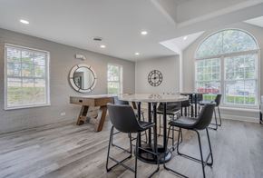 Reynoldsburg apartment for rent - A dining room with a round table and chairs.