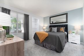 Dublin apartment for rent - Spacious bedroom with a king-sized bed at Britton Woods Apartments in Dublin, Ohio