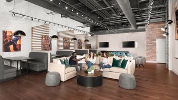 Cincinnati apartment for rent - a group of people sitting on a couch in a living room
