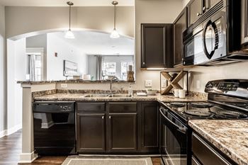 Espresso colored kitchen cabinetry