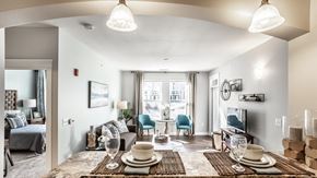 Indianapolis apartment for rent - A well-lit dining area with a table set for two.