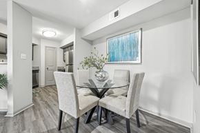 Fishers apartment for rent - A dining room with a glass table and chairs.
