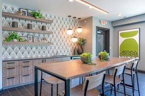 Cincinnati apartment for rent - a dining room with a table and chairs