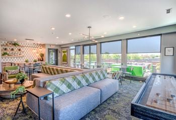 Rooftop lounge with entertainment and shuffleboard
