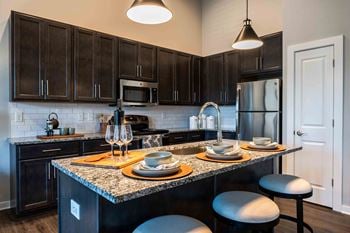 Granite countertops & stainless steel appliances