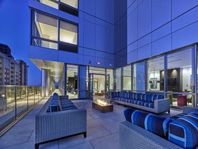 New Brunswick apartment for rent - a lounge area at an office building with a fire pit