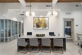 Tucson apartment for rent - A dining room with a large table and chairs.