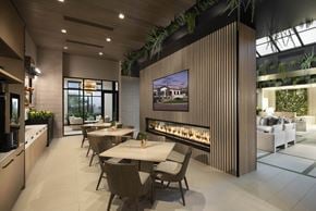 Tucson apartment for rent - A modern dining room with a long table and chairs.