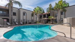 Tucson apartment for rent - sunny pool area with apartments in background