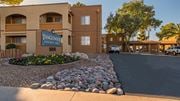 Tucson apartment for rent - Tanglewood community sign with well kept entrance and flowers all around
