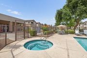 Casa Grande apartment for rent - A small pool with a slide in the middle of a concrete patio.