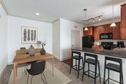 Goodyear apartment for rent - a kitchen and dining area in a 555 waverly unit