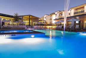 Tucson apartment for rent - a swimming pool at night at the resort at night