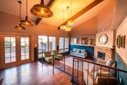 Tucson apartment for rent - A living room with a fireplace and a couch.
