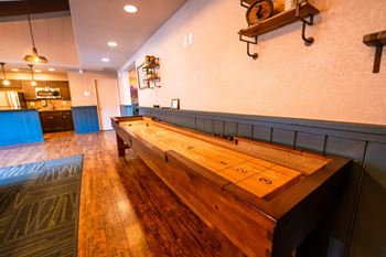 Game area with pool table and shuffle board