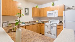 Casa Grande apartment for rent - Desert Sands kitchen equipped with all white appliances.