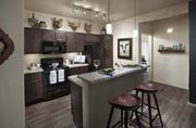 Oro Valley apartment for rent - a kitchen with a bar and stools
