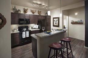 Oro Valley apartment for rent - a kitchen with a bar and stools