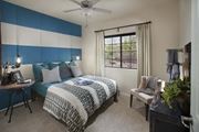 Oro Valley apartment for rent - a bedroom with a bed and a ceiling fan