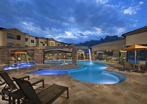 Oro Valley apartment for rent - a swimming pool at the resort at night