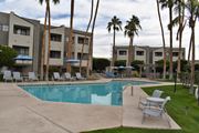 Yuma apartment for rent - El Encanto pool view with plenty of lounging and relaxation space.