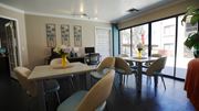 Tucson apartment for rent - A dining room with a table and chairs.