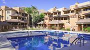 Tucson apartment for rent - A large swimming pool in front of apartment buildings.