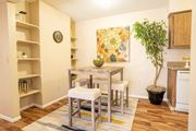 Tucson apartment for rent - A kitchen with a dining table and chairs.