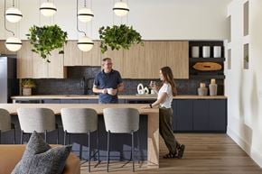 Lacey apartment for rent - a man and a woman standing at a kitchen counter