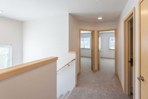 Sumner townhouse for rent - a view of the hallway from the top of the stairs in a 555 waverly unit