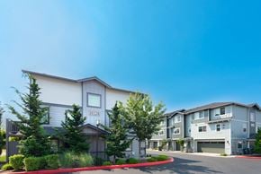 Sumner townhouse for rent - the view of an apartment building with a street in front of it