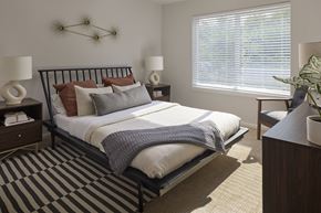Port Orchard apartment for rent - a bedroom with a bed and two windows