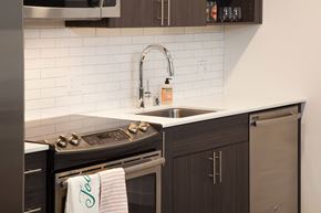 Kent apartment for rent - a small kitchen with a sink and a stove